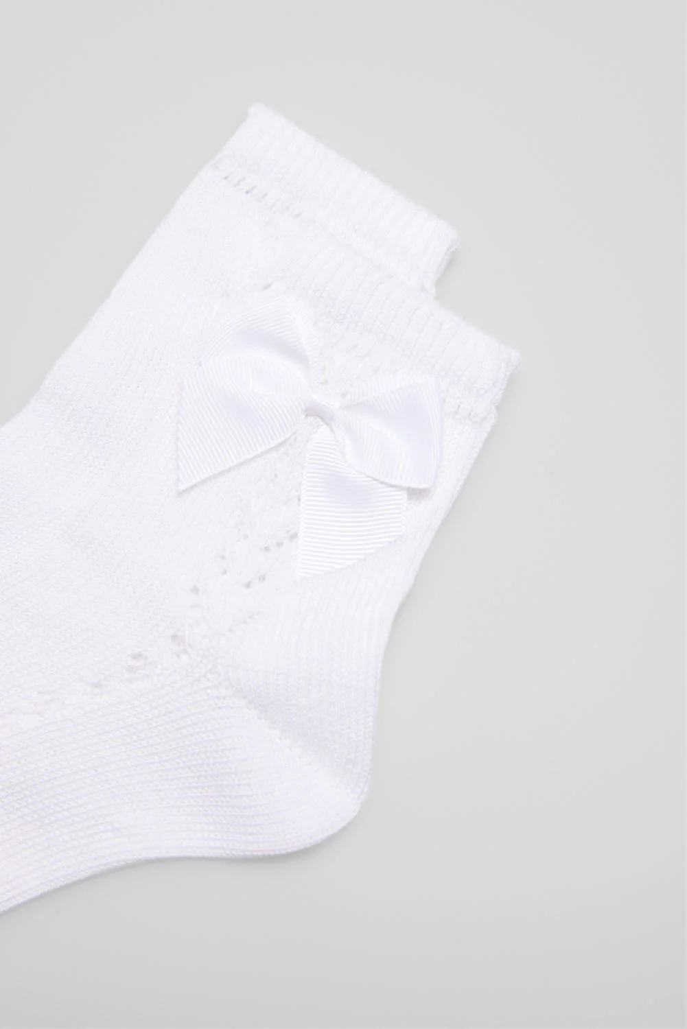 Calzini per bambini bianchi traforati - immagine 3
