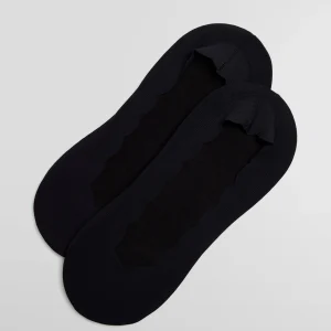 Mignoli invisibili in cotone tinta unita con fascia in silicone di colore nero