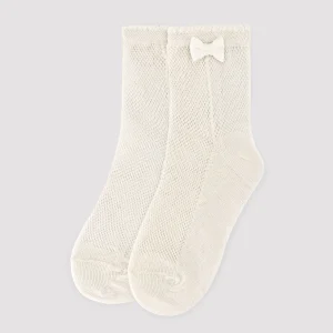 Calzini traforati per bambini con fiocco color avorio