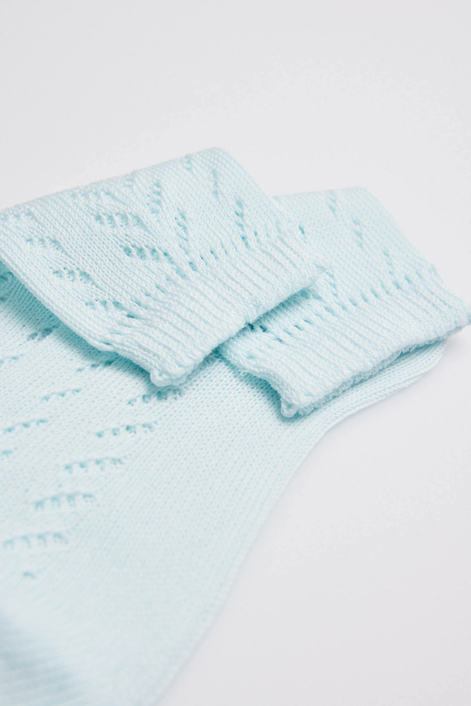 Calzini traforati azzurri per bambino - immagine 3