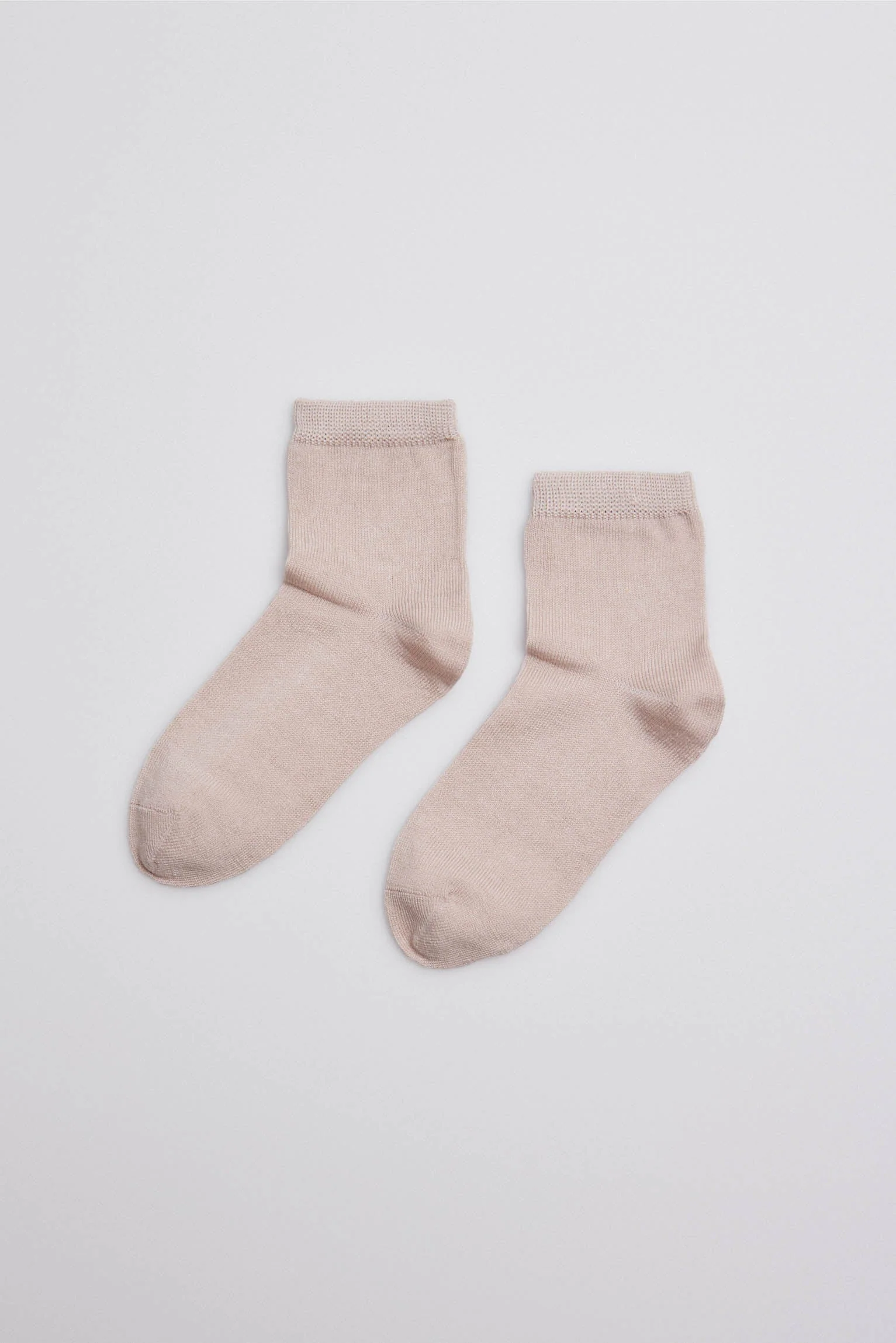 Calzini beige con perle per bambini - immagine 2